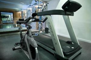 a bike on a treadmill in a gym at Awwa Suites & Spa in Buenos Aires