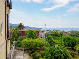 a view from the balcony of a house at De Vivo Realty - Coco's Apartments in Meta