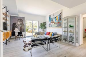 a living room with a couch and a table at Italian Experience-Art&Sea House in Fano