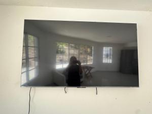 a person taking a picture in a mirror at Villa La Dueña in San Felipe de Puerto Plata