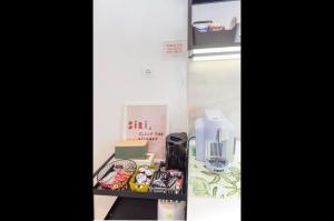 a shelf with some items on it in a room at Casa Teresa in Rome