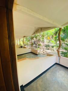a view from the inside of a house at Super Bistro in Pottuvil +1 photo