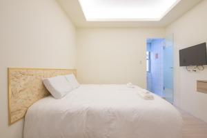 Postel nebo postele na pokoji v ubytování Hostel Jiizu