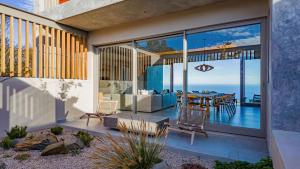 a house with a view of the ocean at Pure Emotions Beach House in Knysna