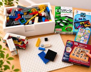 a lego lunch box filled with toys and legos at Grand Reve KODEKI Near Nagoya Dome in Yadachō