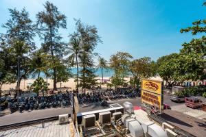 a large group of motorcycles parked in a parking lot at The Taksim Bangla Beach Hotel in Patong Beach +53 photos