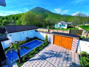 an overhead view of a house with a swimming pool at Gabala lux house in Gabala