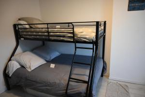 a couple of bunk beds in a room at Les Hauts de Proisy in Proisy