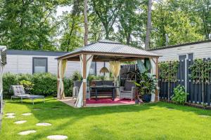 a gazebo in the backyard of a house at La Pura Vida - Glamping in Brandenburg an der Havel