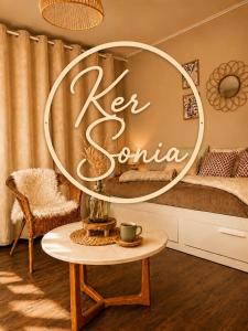 a round mirror in a room with a bed at Ker Sonia in Angers
