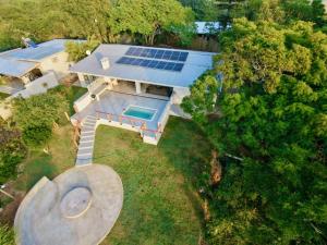 an overhead view of a house with solar panels on its roof at First Light Serenity in Hluhluwe