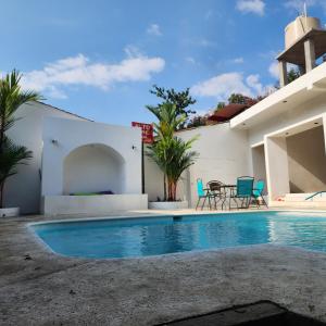 a swimming pool in the backyard of a villa at Casa Vidalta in San Sebastián