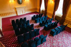 an overhead view of a room with chairs in a room at The George Hotel in Penrith