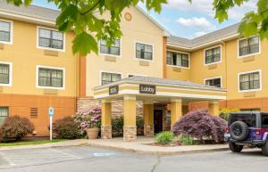 a hotel with a car parked in front of it at Extended Stay America - Providence - West Warwick in West Warwick