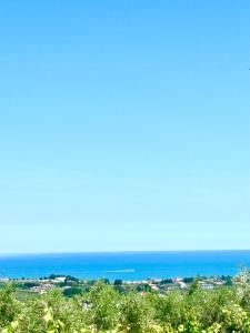 a view of the ocean from the top of a hill at Linea d Orizzonte in Francavilla al Mare