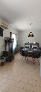 a room with a bed and a table in it at Antonia in Galissas