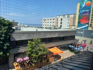 a building with a food stand in front of it at Appartement 2 - Est in Rimouski