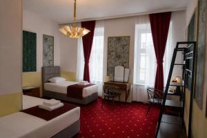 a hotel room with two beds and a ladder at Hotel Viki in Vienna +76 photos