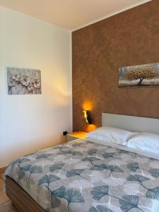 a bedroom with a bed in a room at Casa Ciccone-L'Aquila in Tornimparte