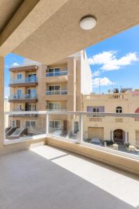 a view from the balcony of a building at Three Bedroom Qormi Home in Santa Venera