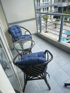 a couple of chairs sitting on a balcony at Dream 3 in Sunny Beach