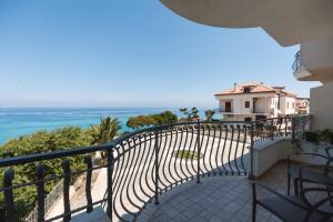 a balcony with a view of the ocean at La Rocca di PA in Tropea