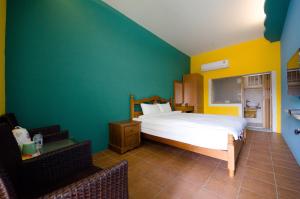 Postel nebo postele na pokoji v ubytování Baisha 31 B&B
