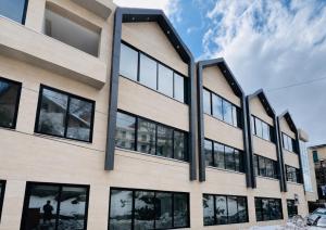 an office building with large windows at Seven sky hotel in Murree