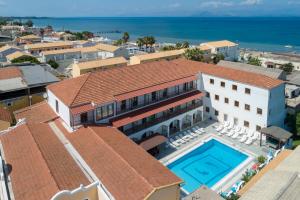 an aerial view of a building with a swimming pool at on the STRIP-Studio 2 in Kavos