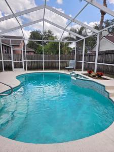 a swimming pool with a clear blue water at Accessible-Friendly Pool Retreat Extended Stay Welcome in Valrico