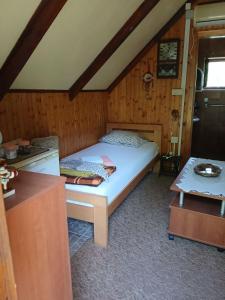 a bedroom with a bed in a room at Hidden Nest For Two in Herceg-Novi