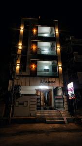 a building at night with lights on it at Sai krishna residency in Pithāpuram