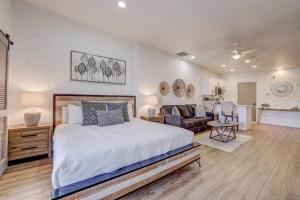 a bedroom with a bed and a living room at Relaxing Quiet Resort - Dog Friendly in St. George +23 photos
