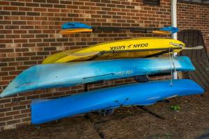 two kayaks sitting on top of a brick wall at Bella Di Lago in Wilkesboro