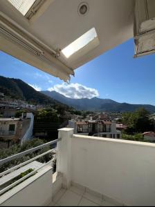 a balcony with a view of the mountains at Villa Apostolidis in Skala Potamias
