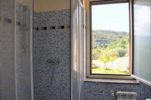 Koupelna v ubytování Villa Gramati