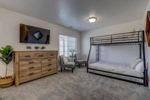 a bedroom with a bunk bed and a dresser at Long Stays Welcome! Pet Friendly & Heated Pool in Washington