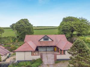 an aerial view of a house in a field at 2 Bed in Minehead oc-77362 in Withypool