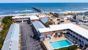 an aerial view of a hotel and the beach at Colonial Inn in Nags Head