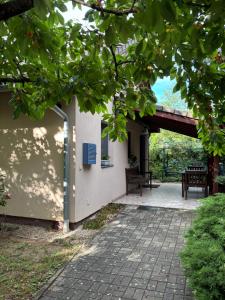 an entrance to a building with a patio at Kinga House in Keszthely