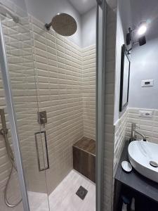 a bathroom with a shower and a sink at Casa di Piera in Poggibonsi +13 photos