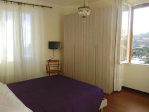 Rúm í herbergi á Albergo Bandoni