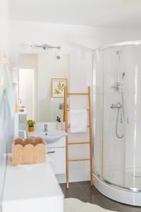 a bathroom with a shower and a sink at DOM GOŚCINNY ROMA in Rewal +85 photos