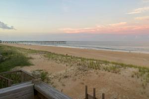 a view of a beach with a pier at 7674 - The Sweet Escape in Avon