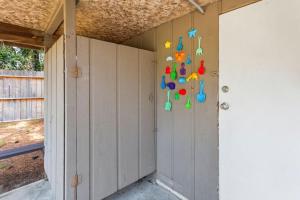 a wall with a bunch of numbers on it at 5041 - The Captains Quarters in Kill Devil Hills