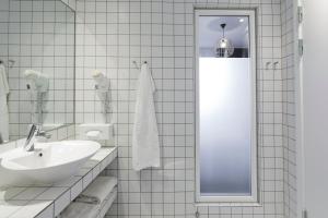 Koupelna v ubytování Hotel Strandparken + 37 fotografií