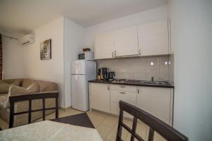Kuchyňa alebo kuchynka v ubytovaní Apartments Kati