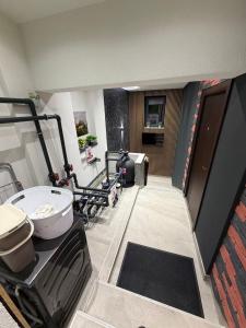 a bathroom with a toilet and a sink in a room at Villa Mešić in Stojčevac