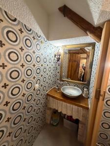 a bathroom with a sink and a mirror at Studio apartman Ema in Umag +21 photos