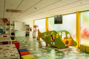 TV a/nebo společenská místnost v ubytování Villa Luz Design & Art Hotel